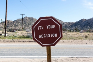 Road Sign with It's Your Decision Written