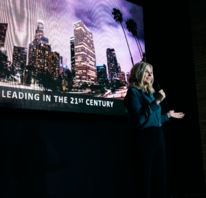 Kim Jones, executive career coach, giving speech at career coaching conference