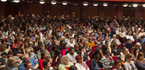 Crowded audience at career coaching conference