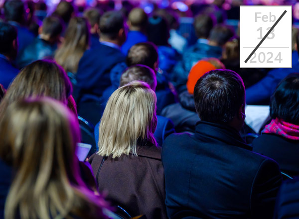 Group of audience members attending career coaching conference